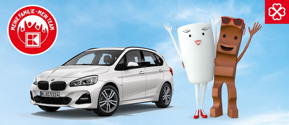 Modellbeispiel: BMW Active Tourer und Schokoriegel mit Milchglas im Arm