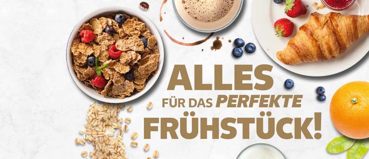 Schriftzug: ALLES FÜR DAS PERFEKTE FRÜHSTÜCK!; Abbildung: Müsli, Croissant, Kaffee und Obst