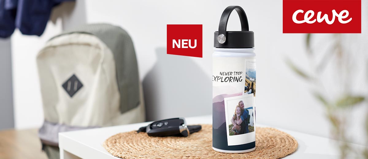 Logo: CEWE; Abbildung: Edelstahl-Trinkflasche mit Foto; Störer: NEU