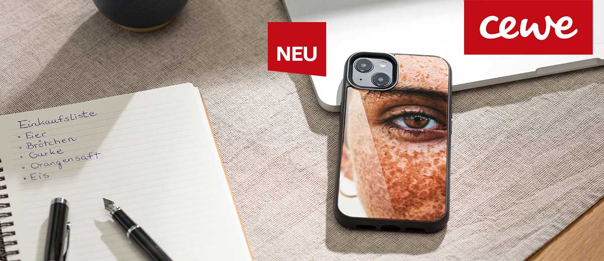 Logo: CEWE; Abbildung: Gallery Case; Störer: Neu; Abbildung: Block mit Füller