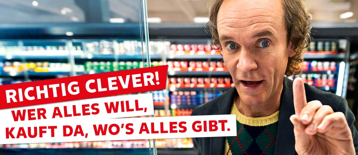 Schriftzug: Richtig clever! Wer alles will, kauft da, wo's alles gibt.; Abbildung: Olaf Schubert in einer Kaufland-Filiale